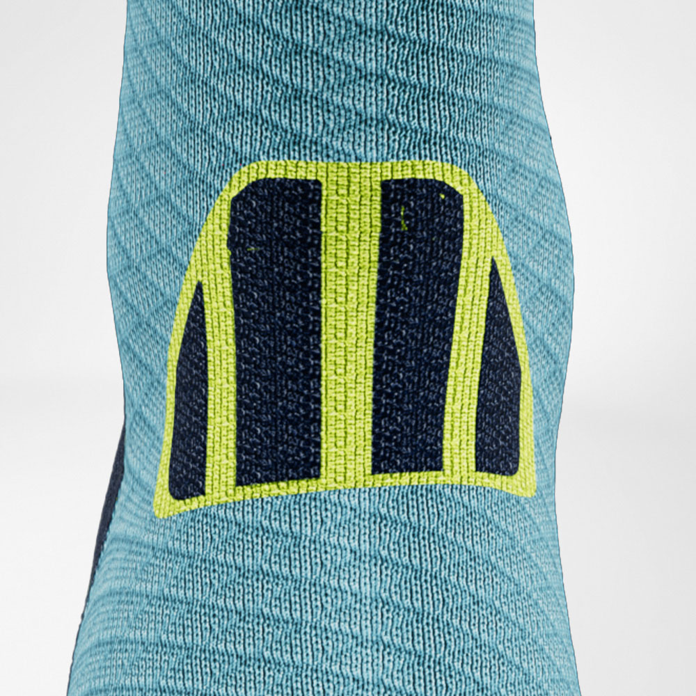 Trailrun-Laufsocken blau-gelb Detail Achilles Comfort Detailansicht des Achillessehenbereiches der blau-gelben Trailrun - Laufsocken