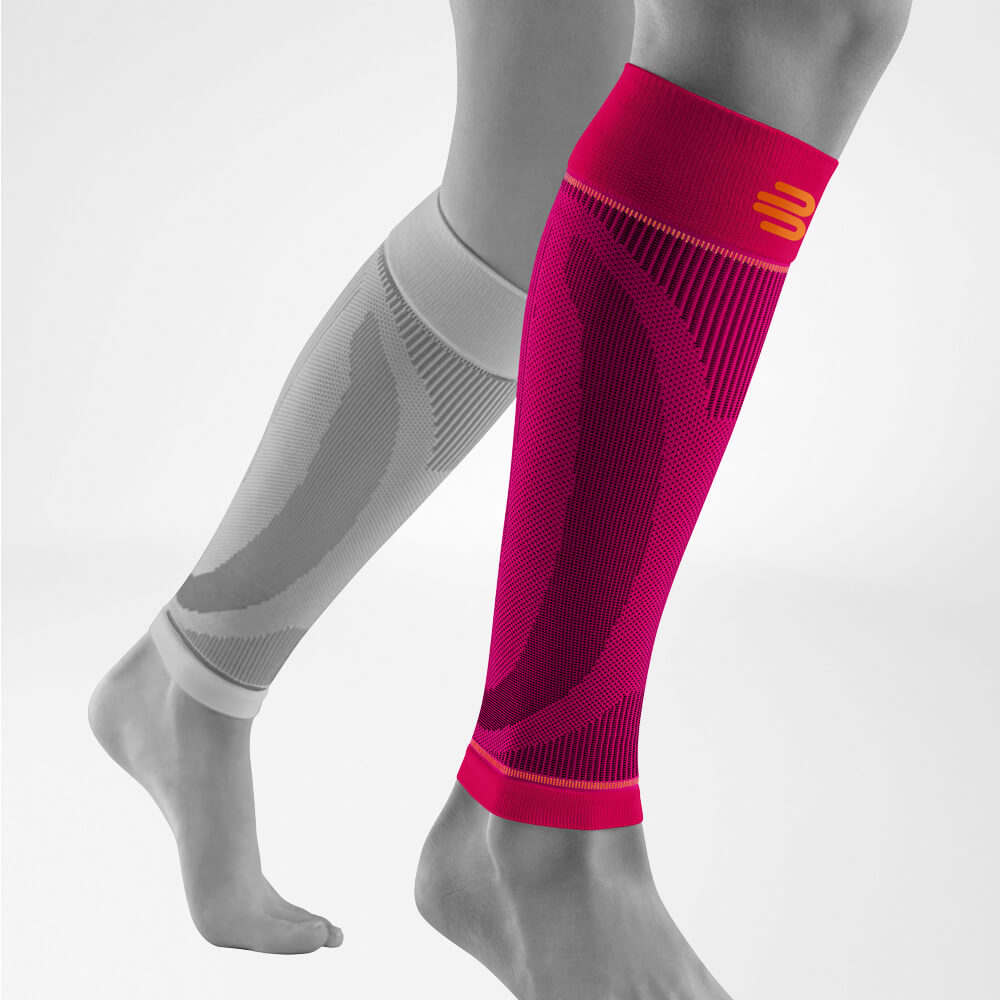 Komplettansicht der pinken Unterschenkel Sport Sleeves am stilisierten grauen Bein